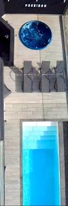 Basen w obiekcie Villa Poseidon Corralejo with Private Heated Pool, Sauna and Stunning Volcano Views by Amazzzing Travel lub w pobliżu