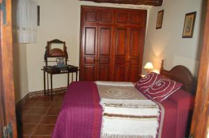 A bed or beds in a room at Casa Fina
