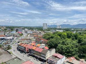 an overhead view of a city with buildings and a street at G Home 1 - Ipoh City Center Majestic 2R2B in Ipoh