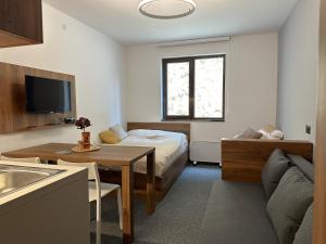 Postel nebo postele na pokoji v ubytování Apartman Kod Gondole Vila Bela Reka
