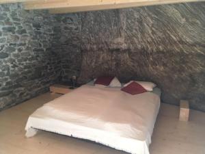 Postelja oz. postelje v sobi nastanitve Rustico Gin Avegno Torbecc, Vallemaggia, Tessin,