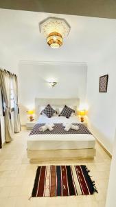 Postel nebo postele na pokoji v ubytování Riad dei colori