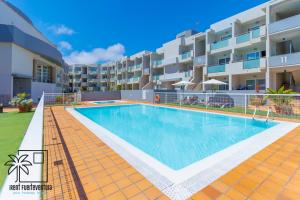 Bazén v ubytovaní Coral Sun Corralejo iRent Fuerteventura alebo v jeho blízkosti