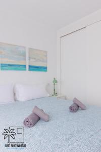 Posteľ alebo postele v izbe v ubytovaní Coral Sun Corralejo iRent Fuerteventura
