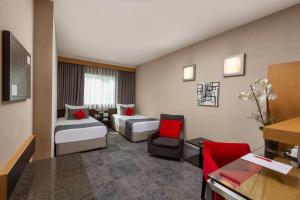 Telewizja i/lub zestaw kina domowego w obiekcie Nippon Hotel
