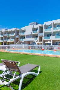 Bazén v ubytovaní Coral Sun Corralejo iRent Fuerteventura alebo v jeho blízkosti