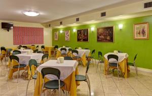 Restorāns vai citas vietas, kur ieturēt maltīti, naktsmītnē Hotel Motel Sporting