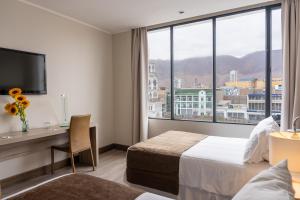 Postel nebo postele na pokoji v ubytování Terrado Arturo Prat Iquique