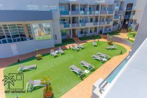 Bazén v ubytovaní Coral Sun Corralejo iRent Fuerteventura alebo v jeho blízkosti