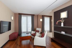 Telewizja i/lub zestaw kina domowego w obiekcie Nippon Hotel