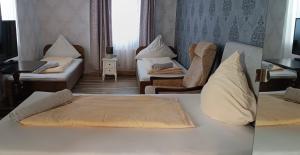 Ein Bett oder Betten in einem Zimmer der Unterkunft The Burgklause Boutique Hotel