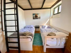 Postel nebo postele na pokoji v ubytování Villa Colapis