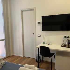 TV a/nebo společenská místnost v ubytování Sunrise Rooms
