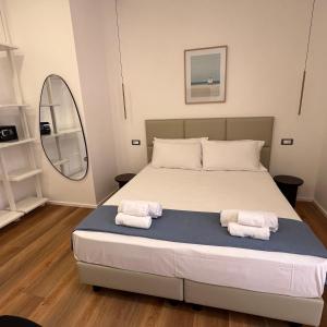 Postel nebo postele na pokoji v ubytování Sunrise Rooms