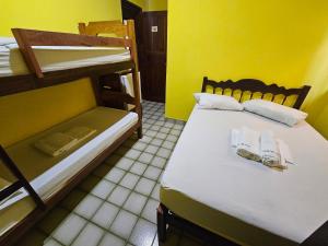 Postel nebo postele na pokoji v ubytování Hostel Beach
