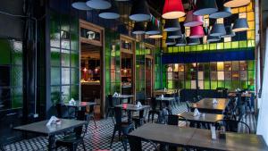 Reštaurácia alebo iné gastronomické zariadenie v ubytovaní Hotel Clasico