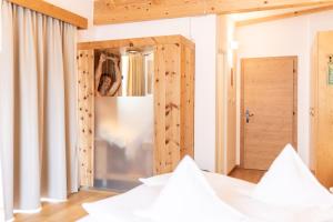 Postel nebo postele na pokoji v ubytování Parkhotel Tirolerhof