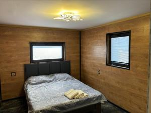 En eller flere senge i et værelse på Shahdag Nature House + 62 billeder