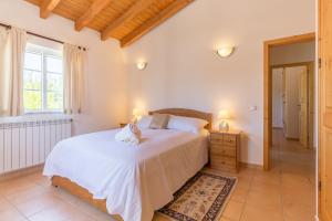 Postel nebo postele na pokoji v ubytování Vila Fantastica + 15 fotografií