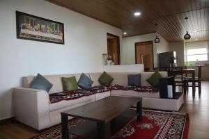 Posezení v ubytování Coral Paradise Homestay