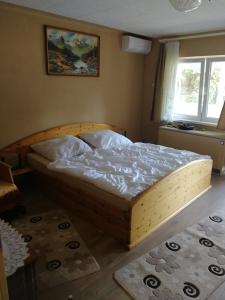 Posteľ alebo postele v izbe v ubytovaní Merkl Apartman- Harkány