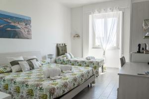 Postel nebo postele na pokoji v ubytování B&B VistaMare