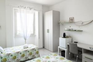 Postel nebo postele na pokoji v ubytování B&B VistaMare