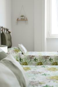 Postel nebo postele na pokoji v ubytování B&B VistaMare