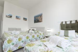 Postel nebo postele na pokoji v ubytování B&B VistaMare