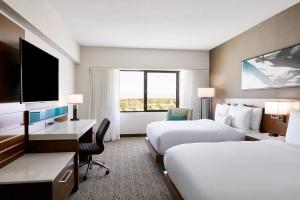 Ένα ή περισσότερα κρεβάτια σε δωμάτιο στο Delta Hotels by Marriott Phoenix Mesa
