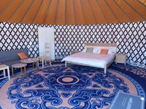 Ένα ή περισσότερα κρεβάτια σε δωμάτιο στο nice Glamping