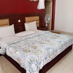 Giường trong phòng chung tại Cameo Residence +18 ảnh