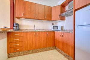 Kuchyň nebo kuchyňský kout v ubytování Apartamentos Callaomar