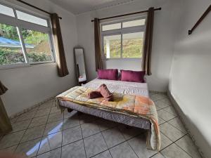 Postel nebo postele na pokoji v ubytování Noha Lodge