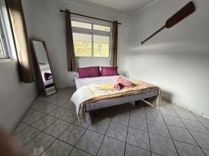 Postel nebo postele na pokoji v ubytování Noha Lodge