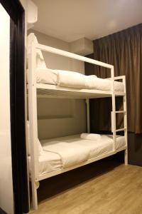 Postel nebo postele na pokoji v ubytování Vio Hotel