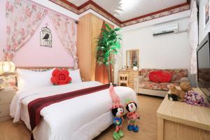 Letto o letti in una camera di Flower Bird House B&B