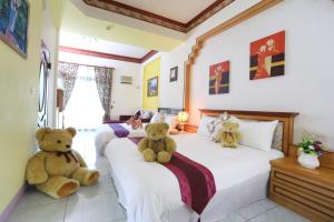 Letto o letti in una camera di Flower Bird House B&B