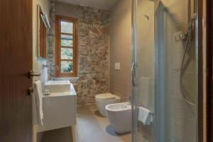 Koupelna v ubytování Villa Wright, ToscanaOneHH + 32 fotografií