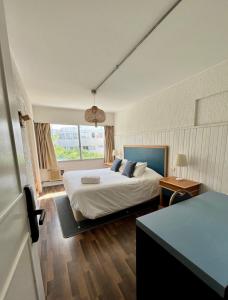 Cama ou camas em um quarto em ZAG Coliving Punta del este