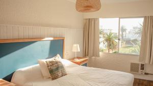 Cama ou camas em um quarto em ZAG Coliving Punta del este