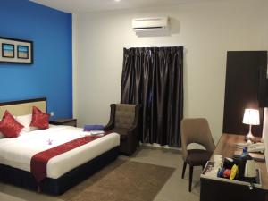Ein Bett oder Betten in einem Zimmer der Unterkunft Royal Agate Beach Resort