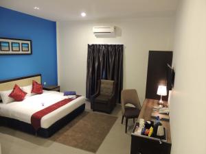 Ein Bett oder Betten in einem Zimmer der Unterkunft Royal Agate Beach Resort