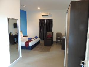 Ein Bett oder Betten in einem Zimmer der Unterkunft Royal Agate Beach Resort