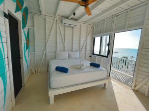 Postel nebo postele na pokoji v ubytování El Faro by ÓOL Hotels