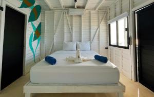 Postel nebo postele na pokoji v ubytování El Faro by ÓOL Hotels