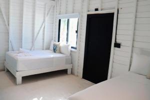 Postel nebo postele na pokoji v ubytování El Faro by ÓOL Hotels