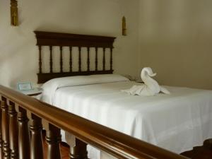 Voodi või voodid majutusasutuse Meson del Alferez Coatepec toas