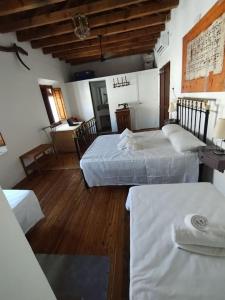 Postel nebo postele na pokoji v ubytování Casa rural con encanto