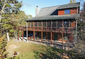a large wooden house with a large deck at Dream Catcher- Blue Ridge GA in Blue Ridge